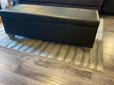 Black faux leather storage ottoman, View more