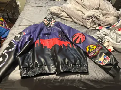 This premium Jeff Hamilton x October's Very Own collaboration jacket, in size large, is a rare pre-l...