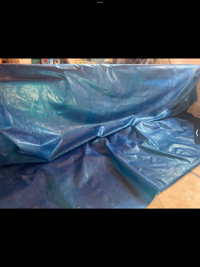 16x32 insulated pool cover, with metal roller, only used one year