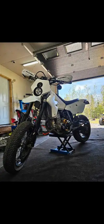 2007 Drz 400 with 440 big bore kit. Wheelie machine 3x3 box mod and a bunch of aftermarket parts. Bi...