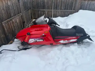 Sleds in good shape only has one small crack on the underside of the plastics. Runs good new clutch...
