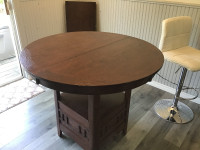 Kitchen pub style table with swivel stools