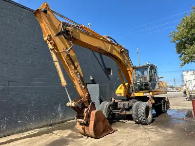 Samsung SE210W Wheeled Excavator Unit# 6995 Manufacturer: Samsung Model: SE210W HRS: 14720 Details:...