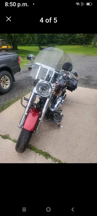 One owner, new leather saddle bags. Has lower kit. Quick detach windshield and sissy bar.