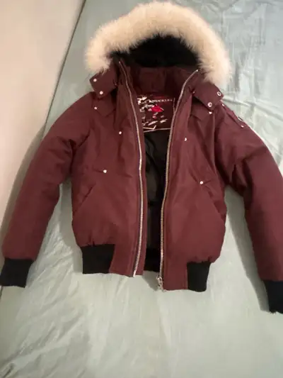 Good condition, extra small Moose knuckle winter jacket. Cuffs have a little wear on them but not vi...