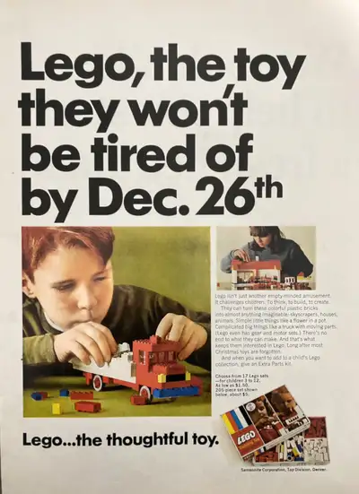 “Lego, the toy they won’t be tired of by Dec. 26th.” Dimensions : 10 1/4 inches wide by 13 1/2 inche...