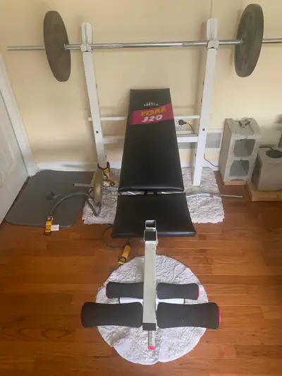 York weight bench with bench bar and weights, View more