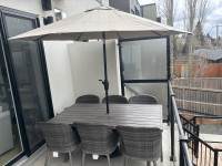 OUTDOOR WICKER TABLE/ 6 CHAIRS AND UMBRELLA 