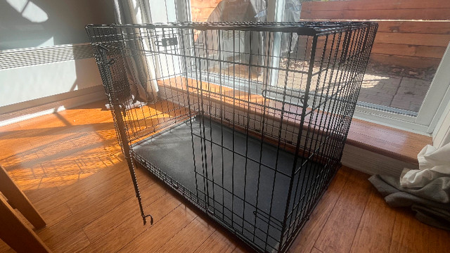 Cage pour chien. 2 portes. Pliante dans Accessoires  à Longueuil/Rive Sud - Image 2