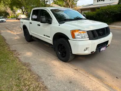 2012 Nissan Titan PRO-4X 4 Door Crew Cab Previous TL due to Hail damage (bought it back) Runs like a...