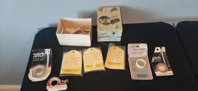 There are some belts for the machines and a splicing kit to fix the broken tape Etc very old from at...