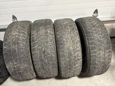 4pcs Bridgestone Blizzark WS80 winter tires 235/65/R17 on steel rims 5 bolts. Almost gone. The rims...