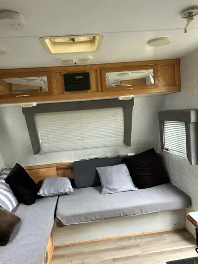 22inches good shape. Sleeps 4 big fridge bathroom with shower. Radio has room for TV clean