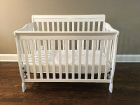 Solid wood baby crib and mattress