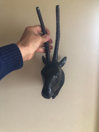 Wall mount steel horse’s ?  With antlers? 