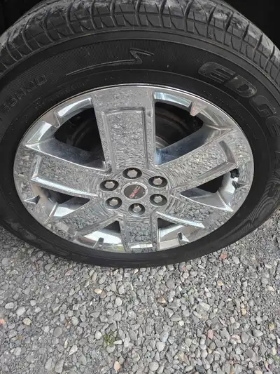 Set of 4 GMC Acadia 20" rims and tires. Tires aren't the greatest. 2 tires barely pass safety, other...