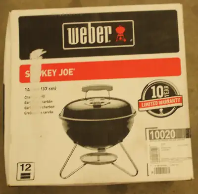 This brand new Weber 14" Smokey Joe Charcoal BBQ was purchased for $70 and has never been used. If l...