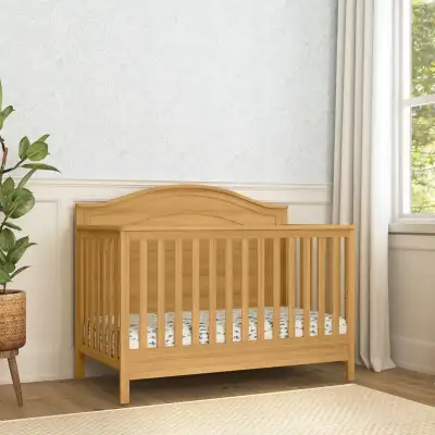 New Charlie 4-in-1 Convertible Crib from Wayfair that retails for $399.99. One piece has a small imp...