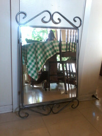 Mirror with wrought iron frame ,glass 20×16 inches a nice piece.