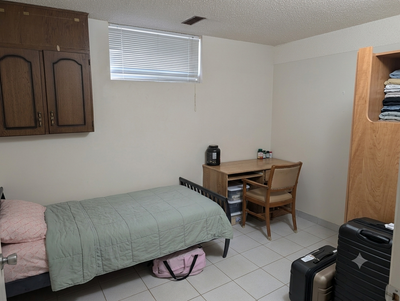 Clean, furnished room for rent starting Sept. 1st in a well-lit basement, sharing kitchen and bathro...