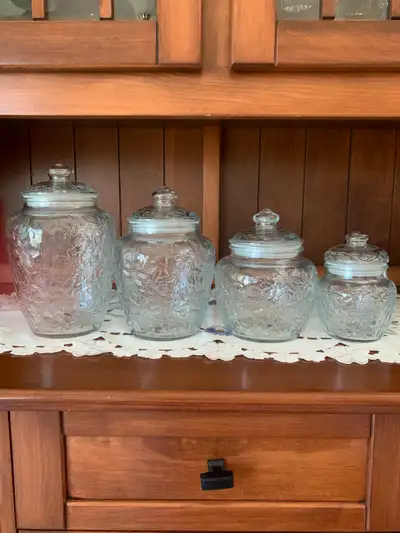 Set of 4 Princess House Glass Canisters. Excellent condition. No chips or cracks.