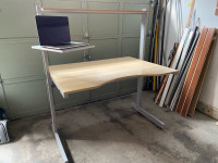 Adjustable computer desk with laptop stand