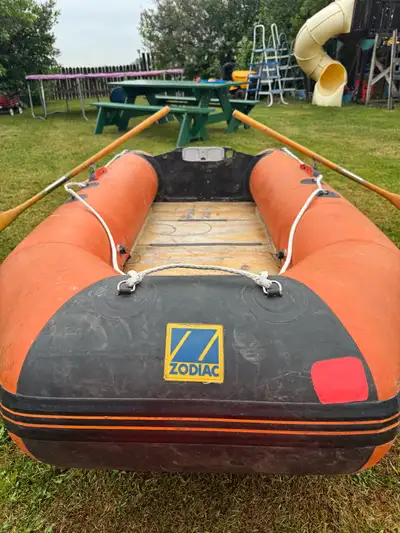 10.5 Zodiac. Good condition. Comes with floor Boards. Wood original oars. Carry bag. I am the second...