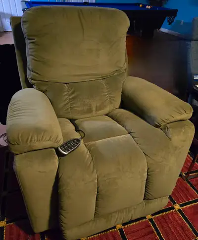 Custom made Lazy Boy recliner. With remote. Previously in the home of Myles Goodwyn