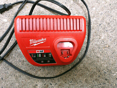Milwaukee m12 battery charger good condition, View more