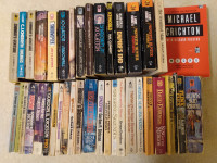 Box of paperback science fiction novels Cherryh, deCamp etc.