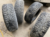 Four nearly new Nokian 225/60R17 winter tires