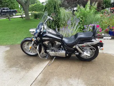 Corbin seat, with back rests, 1 owner, near new tires, side saddle bags.