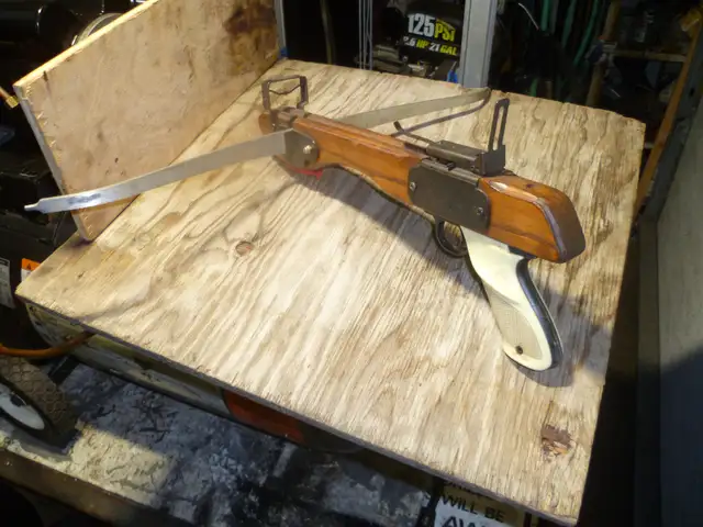 COMPOUND GUN
