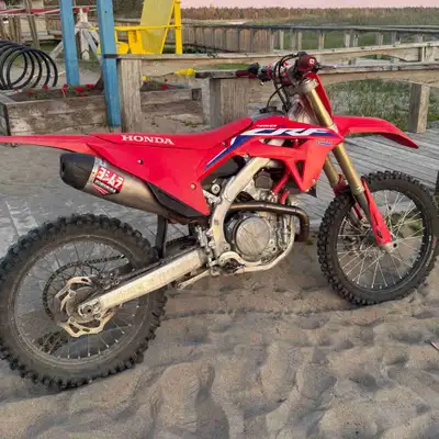 Clean 2022 Honda crf 450r, never raced, trails, fields and backroads ridden, have ownership not rush...