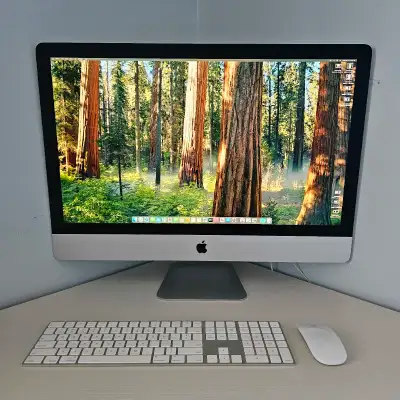 This is a used 27-inch Apple iMac Retina 5K from 2020, featuring a 3.8 GHz 8-Core Intel Core i7 proc...