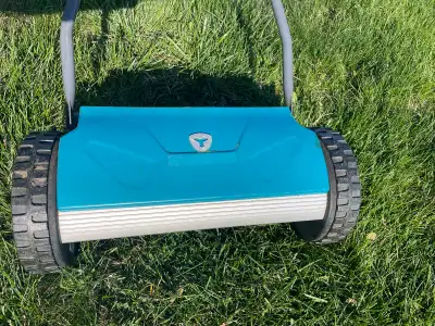 Used Yardworks 14” compact lawn reel mower. Easily adjustable height, breaks down into a small packa...