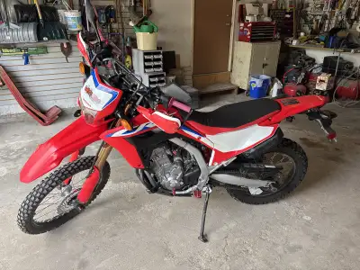I'm selling a 2021 Honda CRF300L, a versatile dual-sport motorcycle perfect for both on-road and off...