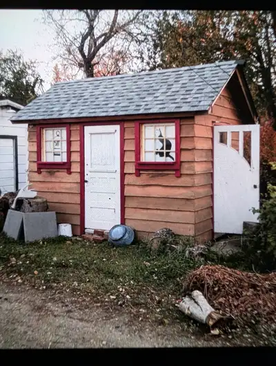 Wooden Shed made, outside is cedar siding