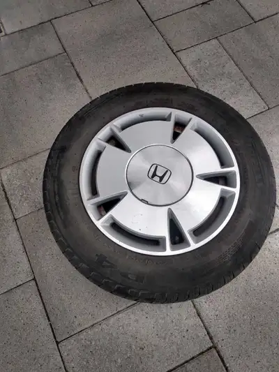 Pirelli P4 tires in excellent condition. More than 50% tread left. 195/65R15 size. Aluminum rims fro...