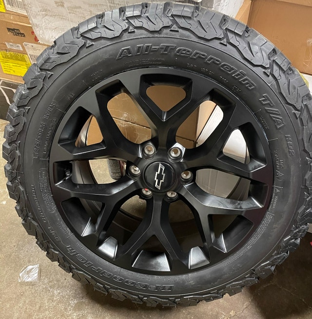 New GMC Yukon Sierra black snowflake wheels and BFG KO2 Tires Tires