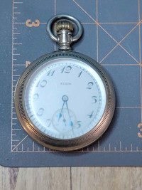 Vintage 1929 Elgin pocket watch.  Well loved and runs 