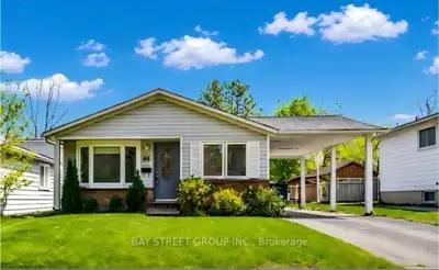 Prime West Waterloo Location! This well-maintained detached bungalow sits on a premium 45x100 ft lot...
