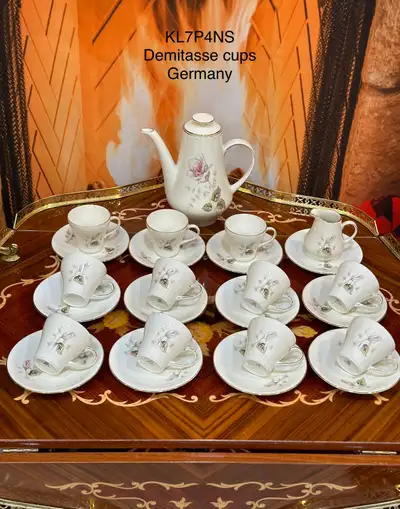 Vintage hand painted demitasse tea set . Rose motif Bavaria Germany Mint condition No signs of use....