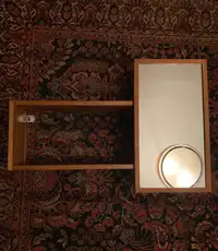 Sliding bathroom mirror with shelving 