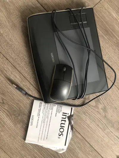 Wacom Intuos 3, tablet and mouse, no pen, must confirm if it is compatible with your computer system...