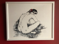 woman painting wood frame