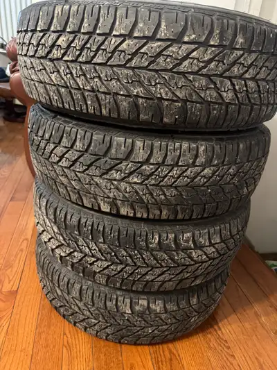 Good condition set of 4 235/65/17 Goodyear ultragrip winter tires made in USA