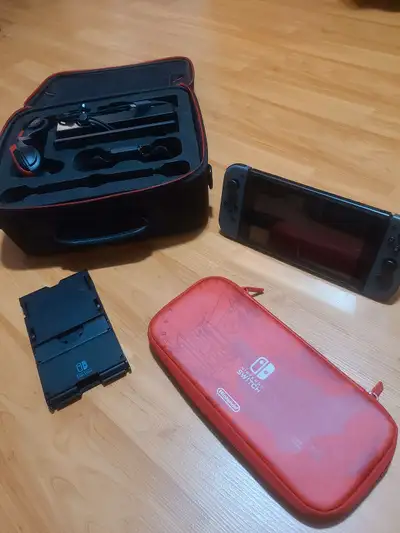 Nintendo Switch + Accessories, View more