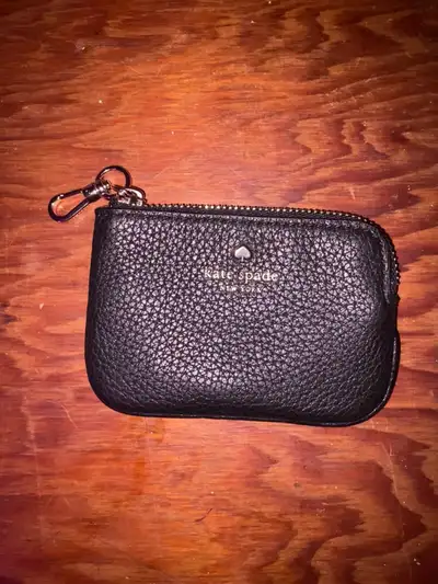 Kate Spade New York black zip coin/card wallet. Unused and in perfect condition. Pebbled leather wit...