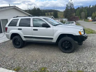06 Grand Cherokee Solid unit Got for camping in at work the seats fold down flat with and was actual...
